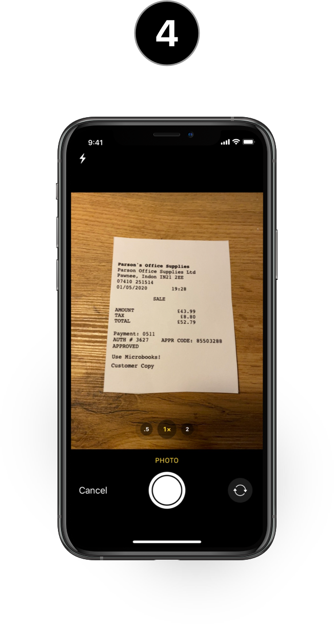 iPhone showing someone taking a picture of a receipt